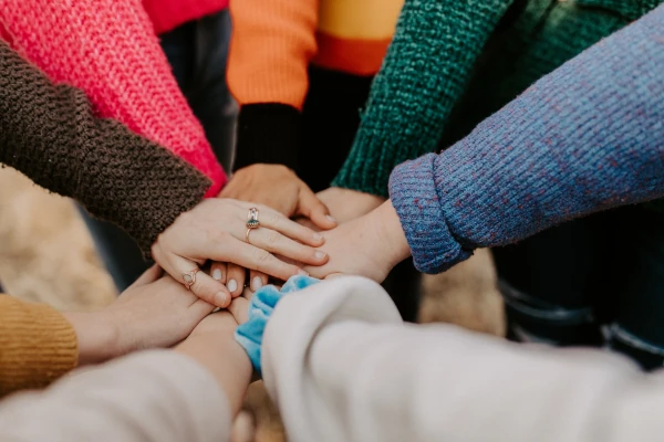 group holding hands